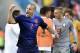 Netherlands' Ron Vlaar celebrates after the group B World Cup soccer match between Australia and the Netherlands at the Estadio Beira-Rio in Porto Alegre, Brazil, Wednesday, June 18, 2014. The Netherlands won the match 3-2. (AP Photo/Martin Meissner)