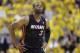 Miami Heat guard Dwyane Wade heads walks up the court during the second half of Game 5 against the Indiana Pacers in the NBA basketball Eastern Conference finals in Indianapolis, Wednesday, May 28, 2014. (AP Photo/Michael Conroy)