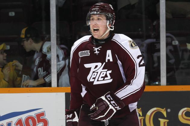 PETERBOROUGH, ON - FEBRUARY 20:  Nick Ritchie #20 of the Peterborough Petes celebrates his empty net goal against the Saginaw Spirit during an OHL game at the Memorial Centre on February 20, 2014 in Peterborough, Ontario, Canada. The Petes defeated the Spirit 5-2. (Photo by Claus Andersen/Getty Images)