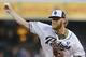 San Diego Padres starting pitcher Andrew Cashner pitches against the Seattle Mariners during the first inning of a baseball game Wednesday, June 18, 2014, in San Diego. (AP Photo/Lenny Ignelzi)