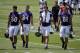 Baltimore Ravens tight ends Crockett Gillmore, from left, Phillip Supernaw, Dennis Pitta and Owen Daniels walk off the field after an NFL football practice, Wednesday, June 18, 2014, at the team's practice facility in Owings Mills, Md. (AP Photo/Patrick Semansky)