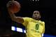 MILWAUKEE, WI - MARCH 20: Mike Moser #0 of the Oregon Ducks grabs a rebound during the second round game of NCAA Basketball Tournament against the Brigham Young Cougars at BMO Harris Bradley Center on March 20, 2014 in Milwaukee, Wisconsin. (Photo by Jonathan Daniel/Getty Images)