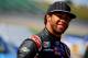 KANSAS CITY, KS - MAY 09: Darrell Wallace Jr., driver of the #54 Toyota Time Sales Event Toyota, stands on the grid during qualifying for the NASCAR Camping World Truck Series SFP 250 at Kansas Speedway on May 9, 2014 in Kansas City, Kansas. (Photo by Will Schneekloth/Getty Images)