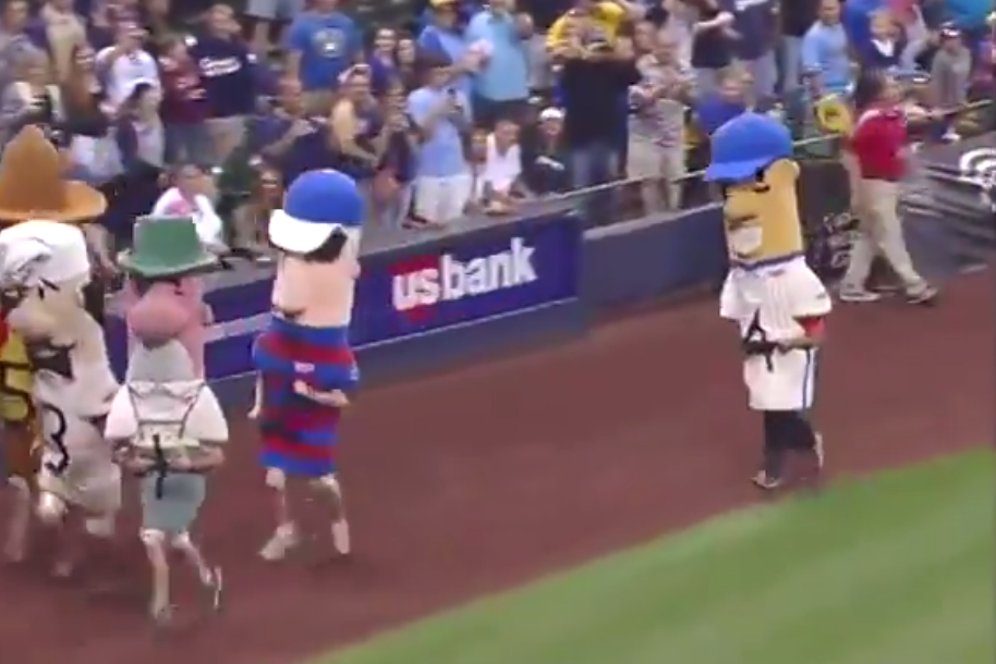 ESPN's Tim Kurkjian competes in Brewers' Sausage Race