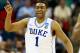 RALEIGH, NC - MARCH 21: Jabari Parker #1 of the Duke Blue Devils reacts in the second half against the Mercer Bears in the second round of the 2014 NCAA Men's Basketball Tournament at PNC Arena on March 21, 2014 in Raleigh, North Carolina. (Photo by Streeter Lecka/Getty Images)