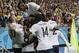 French players celebrate after France's Karim Benzema, left, scored his side's fourth goal during the group E World Cup soccer match between Switzerland and France at the Arena Fonte Nova in Salvador, Brazil, Friday, June 20, 2014. (AP Photo/Christophe Ena)