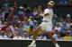 Rafael Nadal of Spain plays a return to Martin Klizan of Slovakia during their match at the All England Lawn Tennis Championships in Wimbledon, London, Tuesday, June 24, 2014. (AP Photo/Sang Tan)