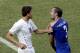 Italy's Giorgio Chiellini (3) complains after Uruguay's Luis Suarez ran into his shoulder with his teeth during the group D World Cup soccer match between Italy and Uruguay at the Arena das Dunas in Natal, Brazil, Tuesday, June 24, 2014. (AP Photo/Hassan Ammar)