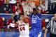 Apr 5, 2014; Arlington, TX, USA; Kentucky Wildcats forward Marcus Lee (00) dunks against Wisconsin Badgers forward Frank Kaminsky (44) in the first half during the semifinals of the Final Four in the 2014 NCAA Mens Division I Championship tournament at AT&T Stadium. Mandatory Credit: Matthew Emmons-USA TODAY Sports