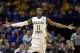 Wichita State's Cleanthony Early celebrates after hitting a shot during the second half of a third-round game against Kentucky of the NCAA college basketball tournament Sunday, March 23, 2014, in St. Louis. (AP Photo/Charlie Riedel)