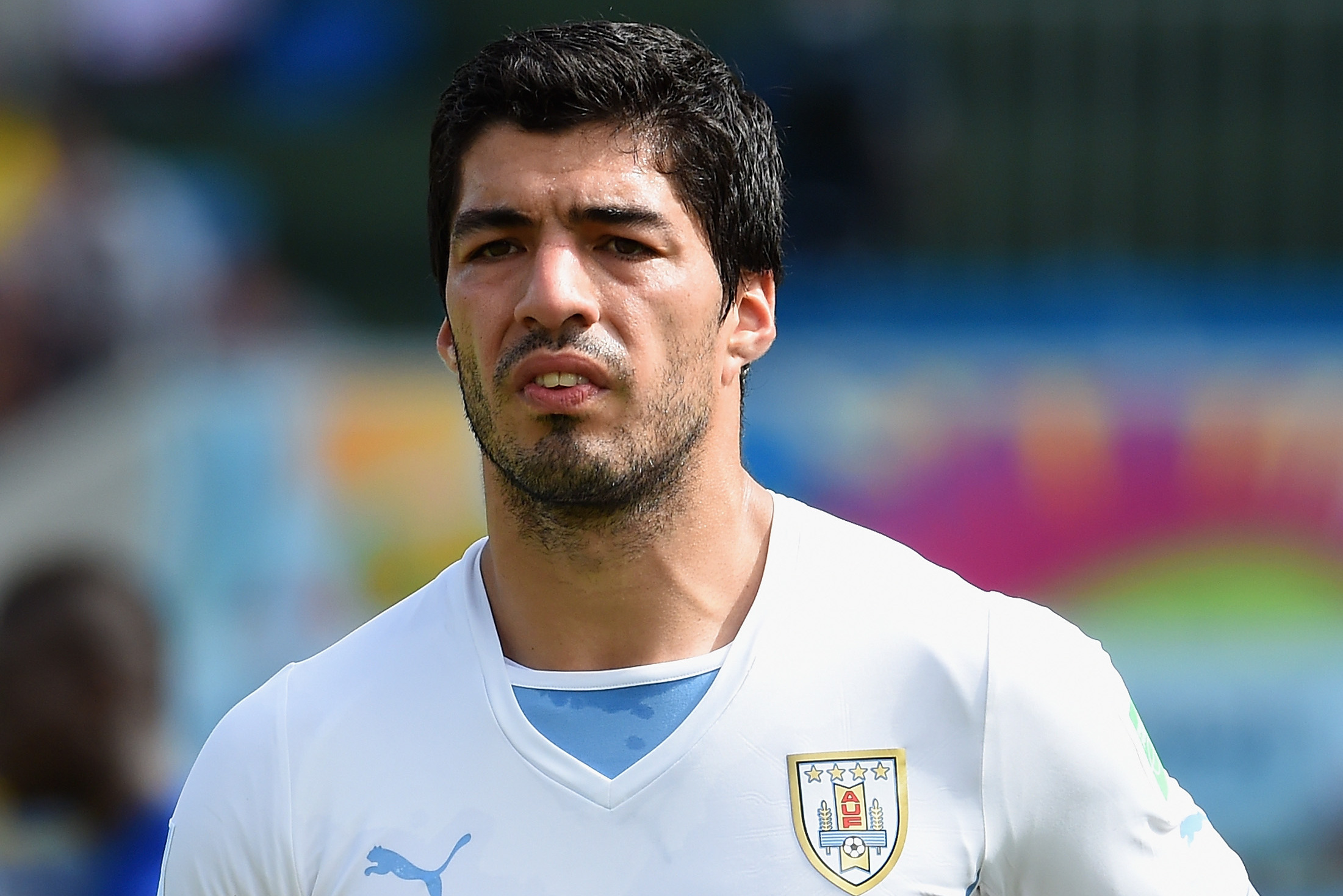 Liverpool Unloads 'The Biter,' Sending Suarez To Barca For $128