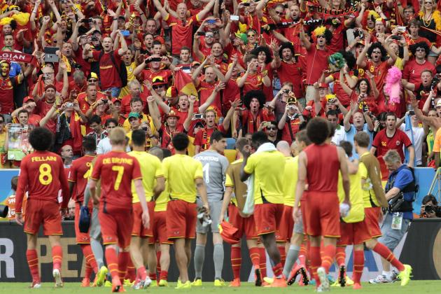 Belgian players celebrate with their supporters after the group H World Cup soccer match between Belgium and Russia at the Maracana Stadium in Rio de Janeiro, Brazil, Sunday, June 22, 2014. Belgium won the match 1-0. (AP Photo/Ivan Sekretarev)
