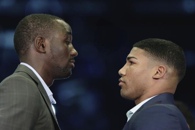 Terence Crawford, left, and Yuriorkis Gamboa pose for a photo at a news conference in Omaha, Neb., Thursday, May 8, 2014,  to announce their world lightweight championship fight in June. Crawford will defend his WBO title in his hometown, in the first world championship fight in Omaha since Joe Frazier stopped Ron Stander in 1972. (AP Photo/Nati Harnik)