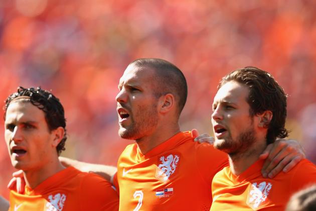 SAO PAULO, BRAZIL - JUNE 23:  (L-R)  Daryl Janmaat, Ron Vlaar and Daley Blind of the Netherlands sing the National Anthem prior to during the 2014 FIFA World Cup Brazil Group B match between the Netherlands and Chile at Arena de Sao Paulo on June 23, 2014 in Sao Paulo, Brazil.  (Photo by Julian Finney/Getty Images)