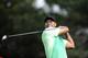 Tiger Woods watches his tee shot on the 16th tee during the first round of the Quicken Loans National golf tournament, Thursday, June 26, 2014, in Bethesda, Md. (AP Photo/Nick Wass)