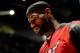 SAN ANTONIO, TX - JUNE 15: LeBron James #6 of the Miami Heat stands on the court for the National Anthem before the game against the San Antonio Spurs Game Five of the 2014 NBA Finals on June 15, 2014 at AT&T Center in San Antonio, Texas. NOTE TO USER: User expressly acknowledges and agrees that, by downloading and or using this photograph, User is consenting to the terms and conditions of the Getty Images License Agreement. Mandatory Copyright Notice: Copyright 2014 NBAE (Photo by Jesse D. Garrabrant/NBAE via Getty Images)