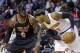 New York Knicks small forward Carmelo Anthony (7) prepares to drive against Miami Heat small forward LeBron James (6) during an NBA basketball game against the New York Knicks in Miami, Thursday, Feb. 27, 2014. (AP Photo/Alan Diaz)