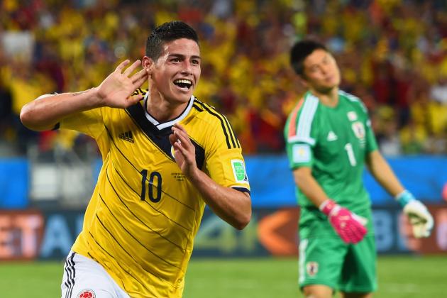 CUIABA, BRAZIL - JUNE 24: James Rodriguez of Colombia celebrates scoring his team's fourth goal past goalkeeper Eiji Kawashima of Japan during the 2014 FIFA World Cup Brazil Group C match between Japan and Colombia at Arena Pantanal on June 24, 2014 in Cuiaba, Brazil. (Photo by Christopher Lee/Getty Images)