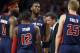 Detroit Pistons head coach John Loyer talks with his team during a timeout in the fourth quarter of an NBA basketball game against the Boston Celtics in Boston, Sunday, March 9, 2014. The Celtics won 118-111. (AP Photo/Michael Dwyer)
