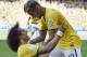 Brazil's David Luiz, left, and Neymar celebrate after Brazil's opening goal during the World Cup round of 16 soccer match between Brazil and Chile at the Mineirao Stadium in Belo Horizonte, Brazil, Saturday, June 28, 2014. (AP Photo/Martin Meissner)
