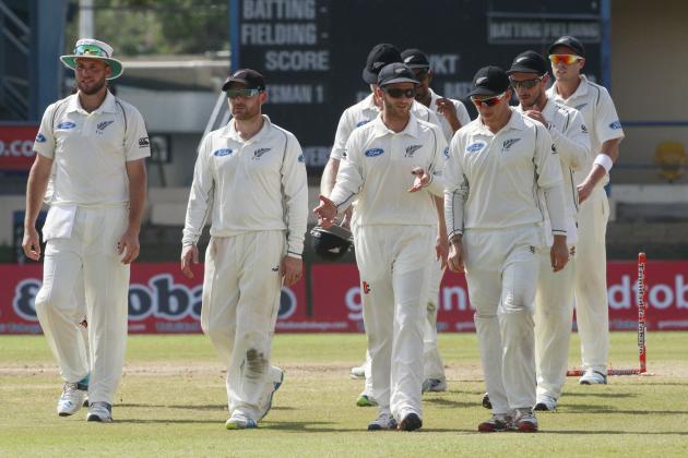 New Zealand's cricket players walk off the pitch after loosing to West Indies at the end of their second cricket Test match in Port of Spain, Trinidad, Friday, June 20, 2014. West Indies won the second Test match by 10 wickets tying the series 1-1. (AP Photo/Arnulfo Franco)
