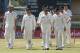 New Zealand's cricket players walk off the pitch after loosing to West Indies at the end of their second cricket Test match in Port of Spain, Trinidad, Friday, June 20, 2014. West Indies won the second Test match by 10 wickets tying the series 1-1. (AP Photo/Arnulfo Franco)