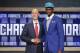 Indiana's Noah Vonleh, right, poses for a photo with NBA Commissioner Adam Silver after being selected ninth overall by the Charlotte Hornets during the 2014 NBA draft, Thursday, June 26, 2014, in New York. (AP Photo/Jason DeCrow)