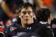 Auburn tight end Philip Lutzenkirchen looks up at the scoreboard as Alabama pulls away to defeat Auburn 42-14 during the second half of an NCAA college football game Saturday, Nov. 26, 2011, in Auburn, Ala. (AP Photo/Butch Dill)