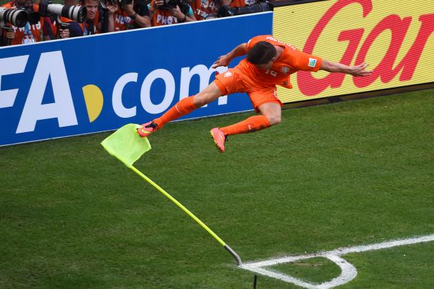 FORTALEZA, BRAZIL - JUNE 29:  Klaas-Jan Huntelaar of the Netherlands celebrates scoring his team's second goal on a penalty kick in stoppage time during the 2014 FIFA World Cup Brazil Round of 16 match between Netherlands and Mexico at Castelao on June 29, 2014 in Fortaleza, Brazil.  (Photo by Jamie McDonald/Getty Images)