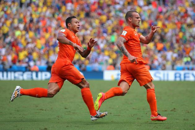 FORTALEZA, BRAZIL - JUNE 29:  Wesley Sneijder of the Netherlands (R) celebrates scoring his team's first goal with Memphis Depay during the 2014 FIFA World Cup Brazil Round of 16 match between Netherlands and Mexico at Castelao on June 29, 2014 in Fortaleza, Brazil.  (Photo by Dean Mouhtaropoulos/Getty Images)