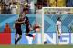 Germany's Thomas Mueller celebrates with his teammate Miroslav Klose, right, after scoring his side's first goal during the group G World Cup soccer match between the United States and Germany at the Arena Pernambuco in Recife, Brazil, Thursday, June 26, 2014. (AP Photo/Ricardo Mazalan)