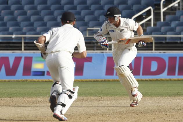 New Zealand's Tom Latham, right, and Kane Williamson run between wicket during the second innings of their first cricket Test match in Kingston, Jamaica, Tuesday, June 10, 2014. (AP Photo/Arnulfo Franco)