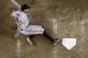 San Francisco Giants' Hunter Pence scores on an RBI double by teammate Buster Posey against the Arizona Diamondbacks during the ninth inning of a baseball game, Sunday, June 22, 2014, in Phoenix. (AP Photo/Matt York)