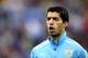 SAO PAULO, BRAZIL - JUNE 19: Luis Suarez of Uruguay sings the National Anthem before the 2014 FIFA World Cup Brazil Group D match between Uruguay and England at Arena de Sao Paulo on June 19, 2014 in Sao Paulo, Brazil. (Photo by Julian Finney/Getty Images)