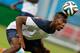 France's midfielder Paul Pogba heads the ball during an official training session the day before the group E World Cup soccer match between France and Switzerland at the Arena Fonte Nova stadium in Salvador, Brazil, Thursday, June 19, 2014. (AP Photo/David Vincent)