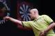 DUBAI, UNITED ARAB EMIRATES - MAY 30: Michael Van Gerwen of the Netherlands plays against Peter Wright of England during the 2014 Dubai Duty Free Darts Masters Final match at Dubai Duty Free Tennis Stadium, Irish Village on May 30, 2014 in Dubai, United Arab Emirates. (Photo by Francois Nel/Getty Images)