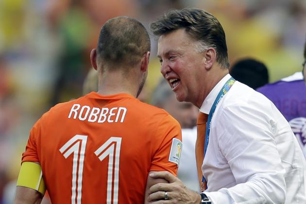 Netherlands' Arjen Robben is greeted by head coach Louis van Gaal after the World Cup round of 16 soccer match between the Netherlands and Mexico at the Arena Castelao in Fortaleza, Brazil, Sunday, June 29, 2014. The Netherlands won the match 2-1. (AP Photo/Natacha Pisarenko)