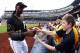 PITTSBURGH, PA - JUNE 27: Andrew McCutchen #22 of the Pittsburgh Pirates signs autographs before the game against the New York Mets at PNC Park on June 27, 2014 in Pittsburgh, Pennsylvania. (Photo by Justin K. Aller/Getty Images)