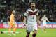 Germany's Mesut Ozil celebrates after scoring his side's second goal in extra time during the World Cup round of 16 soccer match between Germany and Algeria at the Estadio Beira-Rio in Porto Alegre, Brazil, Monday, June 30, 2014. Germany defeated Algeria 2-1 to advance to the quarterfinals. (AP Photo/Matthias Schrader)