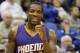 Phoenix Suns guard Eric Bledsoe (2) laughs after talking with referee Sean Corbin, left, during the third quarter of an NBA basketball game against the Minnesota Timberwolves in Minneapolis, Sunday, March 23, 2014. The Suns won 127-120. (AP Photo/Ann Heisenfelt)