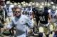 Notre Dame football coach Brian Kelly leads his team out onto the field at the Blue and Gold Game which marks the end of spring football practice April 21, 2012 in South Bend, Ind. (AP Photo/Joe Raymond)