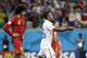 United States' Julian Green, right, celebrates after scoring during the World Cup round of 16 soccer match between Belgium and the USA at the Arena Fonte Nova in Salvador, Brazil, Tuesday, July 1, 2014. At left is Belgium's Marouane Fellaini.(AP Photo/Felipe Dana)