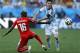 CORRECTS NAME OF MARCOS ROJO TO GELSON FERNANDES - Switzerland's Gelson Fernandes, left, tries to stop Argentina's Lionel Messi during the World Cup round of 16 soccer match between Argentina and Switzerland at the Itaquerao Stadium in Sao Paulo, Brazil, Tuesday, July 1, 2014. (AP Photo/Victor R. Caivano)