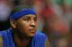 CHICAGO, IL - OCTOBER 31: Carmelo Anthony #7 of the New York Knicks watches from the bench as his teammates take on the Chicago Bulls at the United Center on October 31, 2013 in Chicago, Illinois. The Bulls defeated the Knicks 82-81. NOTE TO USER: User expressly acknowledges and agrees that, by downloading and or using this photograph, User is consenting to the terms and conditions of the Getty Images License Agreement. (Photo by Jonathan Daniel/Getty Images)
