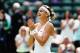 LONDON, ENGLAND - JULY 01: Lucie Safarova of Czech Republic celebrates winning her Ladies' Singles quarter-final match against Ekaterina Makarova of Russia on day eight of the Wimbledon Lawn Tennis Championships at the All England Lawn Tennis and Croquet Club on July 1, 2014 in London, England. (Photo by Jan Kruger/Getty Images)