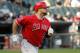 Los Angeles Angels' Albert Pujols watches his home run off Chicago White Sox starting pitcher Hector Noesi during the fifth inning of a baseball game Tuesday, July 1, 2014, in Chicago. (AP Photo/Charles Rex Arbogast)