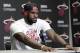 Miami Heat's LeBron James pauses during a news conference in Miami, Tuesday, June 17, 2014. James says he's going on vacation with his family before making any decisions about his future. The Miami Heat held their season-wrapup team meeting on Tuesday afternoon and one of the biggest questions is about the future of the roster. James could become a free agent in a couple of weeks and the four-time MVP says he still has not thought about his plans.(AP Photo/Alan Diaz)