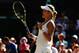 LONDON, ENGLAND - JULY 03: Eugenie Bouchard of Canada celebrates match point and winning her Ladies' Singles semi-final match against Simona Halep of Romania on day ten of the Wimbledon Lawn Tennis Championships at the All England Lawn Tennis and Croquet Club on July 3, 2014 in London, England. (Photo by Matthew Stockman/Getty Images)