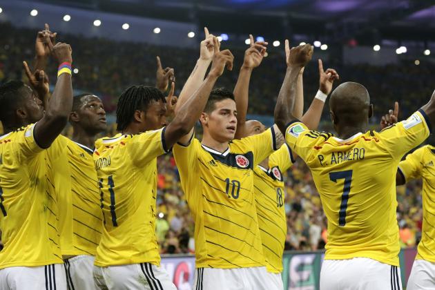Colombia's James Rodriguez (10) celebrates with his teammates after he scored his side's second goal during the World Cup round of 16 soccer match between Colombia and Uruguay at the Maracana Stadium in Rio de Janeiro, Brazil, Saturday, June 28, 2014. (AP Photo/Marcio Jose Sanchez)