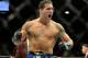 Chris Weidman reacts after knocking down Anderson Silva during the second round of their UFC 162 mixed martial arts middleweight championship bout at the MGM Grand Garden Arena on Saturday, July 6, 2013, in Las Vegas. (AP Photo/David Becker)